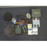 A box of military items; helmet, flask, bugle, paperwork, etc.