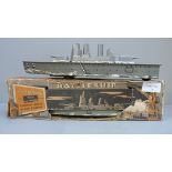 Two Mettoy sparking tin plate battleships, one boxed