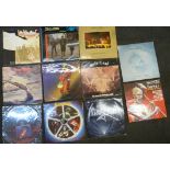 Twelve LP records and 12" singles, including Led Zeppelin II, Deep Purple, Motorhead and The Jam