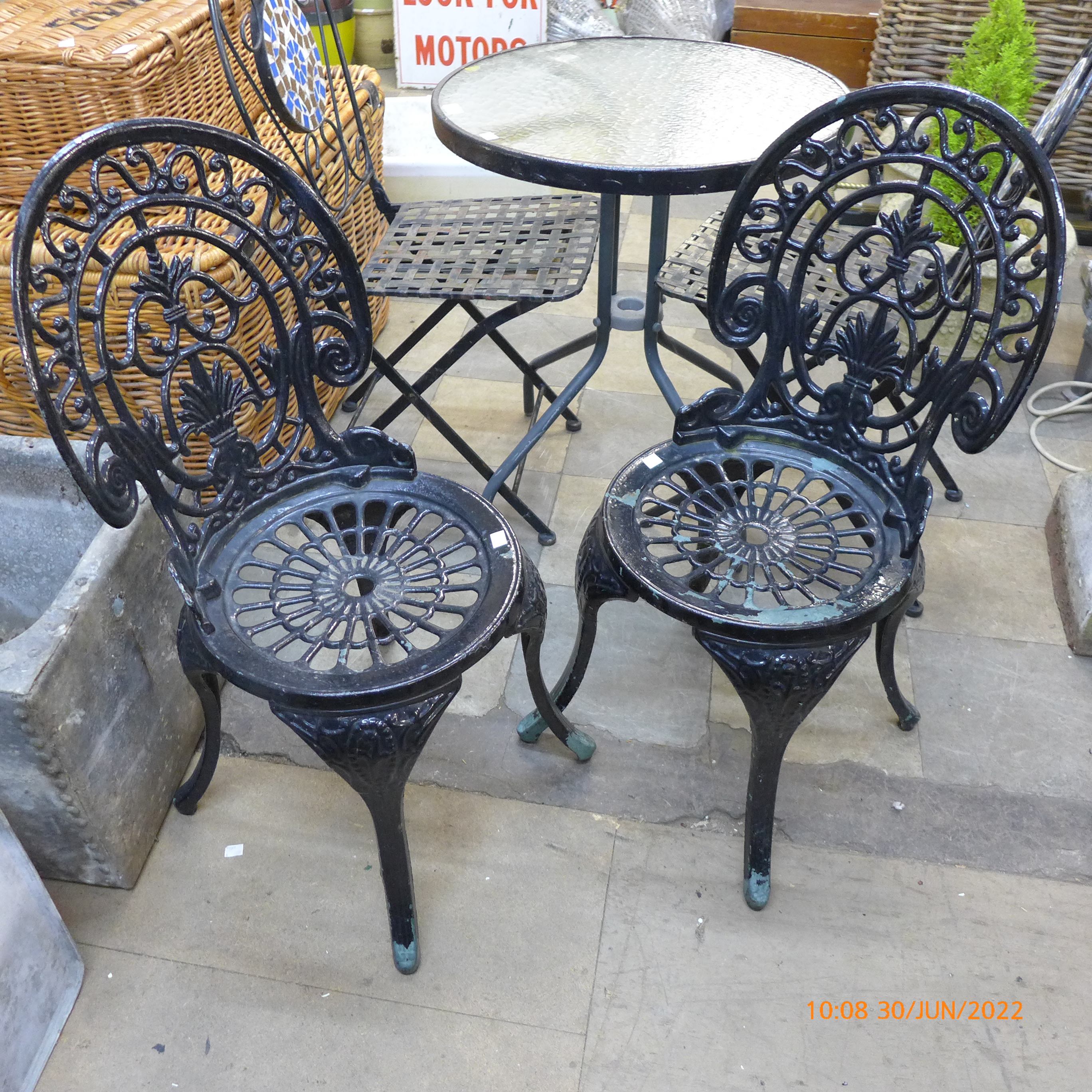 A painted cast alloy garden table and a pair of cast iron chairs - Image 2 of 3