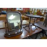 A mahogany toilet mirror and an occasional table