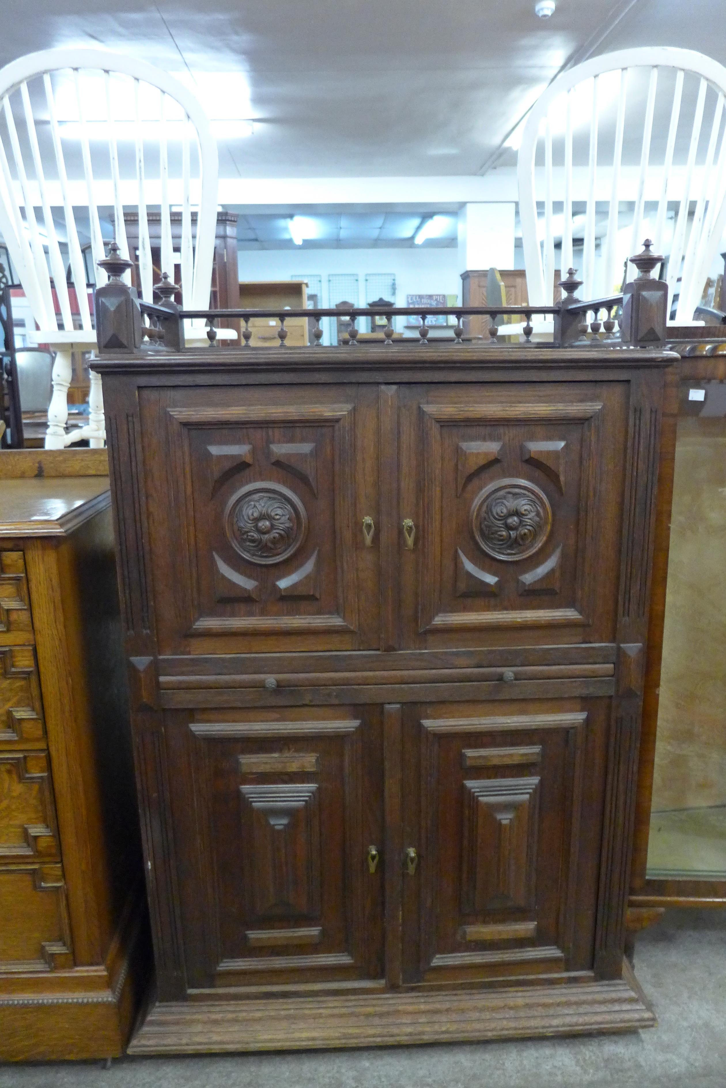 A 19th Century French carved oak four door cupboard - Image 2 of 2