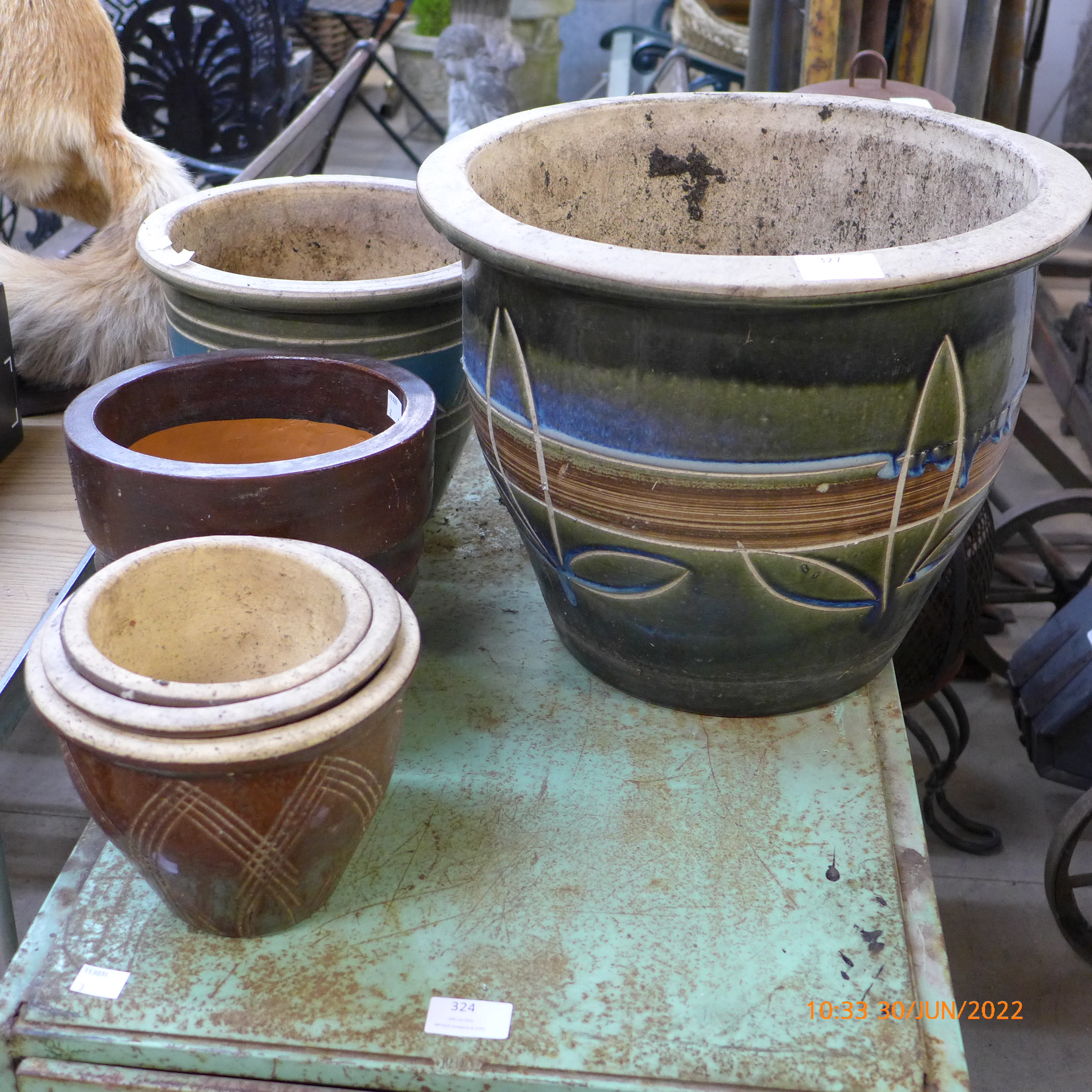 Six terracotta plant pots