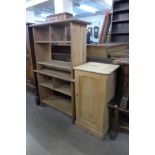 A Victorian pine pot cupboard and a pair of pine stands