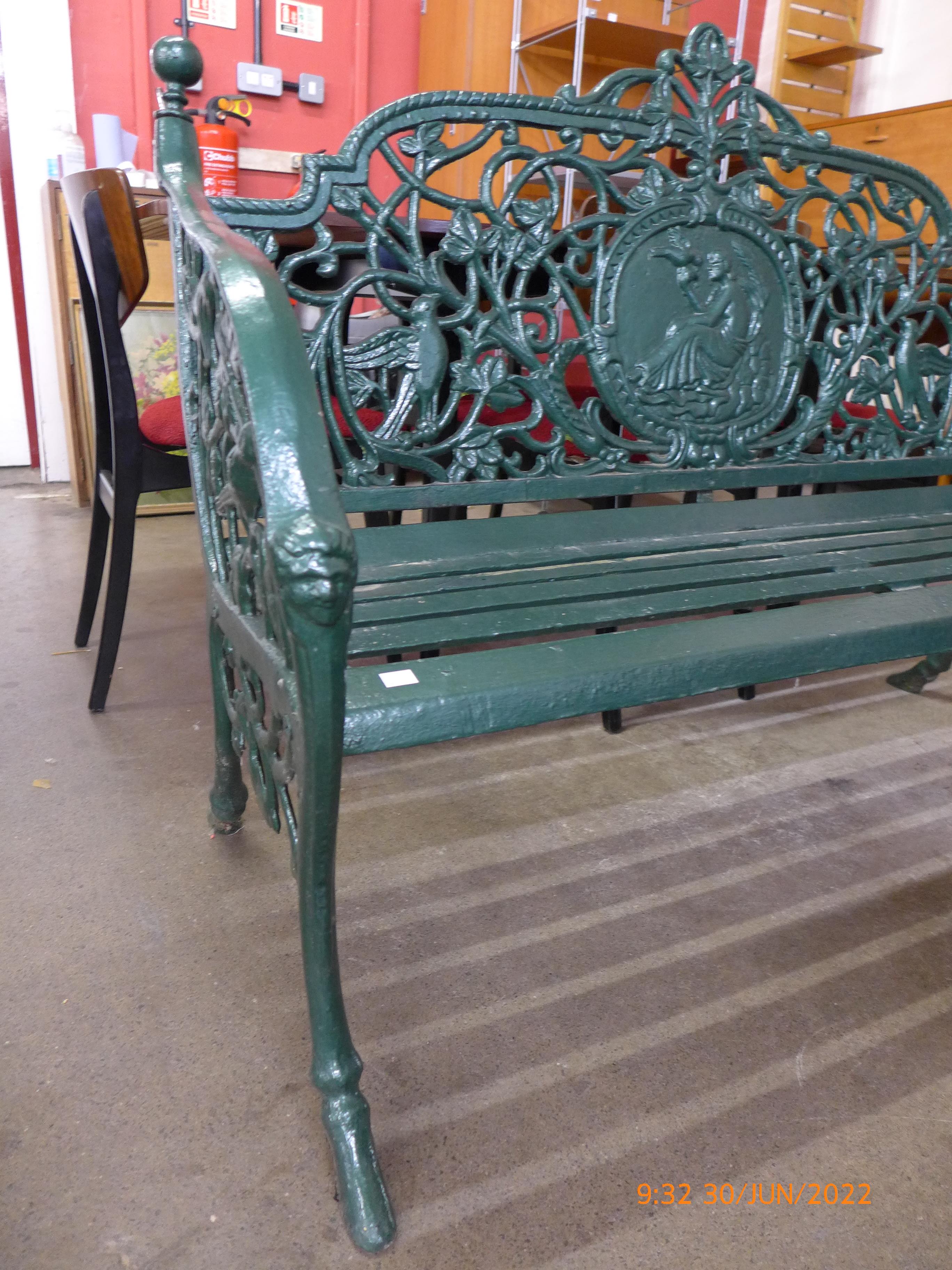 A Victorian style painted cast iron garden bench - Image 2 of 4