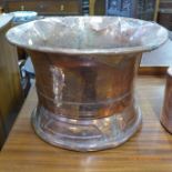 An Arts and Crafts copper jardiniere