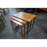 A Danish teak nest of tables