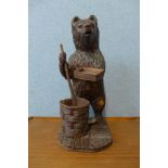 A large Black Forest carved softwood figure of a bear