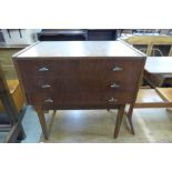 A teak sewing box