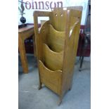 An Arts and Crafts Glasgow School inlaid oak newspaper stand