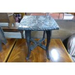 A small early 20th Century Liberty & Co. carved softwood Japanese table