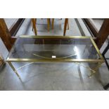 An Italian rectangular brass and glass topped coffee table