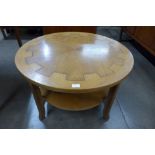 A Nathan oak circular coffee table