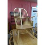 An Ercol Blonde elm and beech Windsor armchair