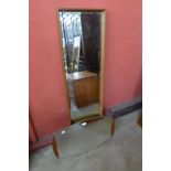 Two teak framed mirrors