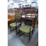 A pair of Hans Wegner style stained beech rocking chairs