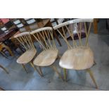 A set of three Ercol Blonde elm and beech Candlestick Lattice dining chairs