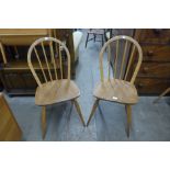 A pair of Ercol Blonde elm and beech Windsor chairs
