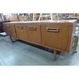 A Beautility teak sideboard