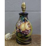 A Moorcroft Queens Choice table lamp base by Emma Bossons, baluster form on a wooden base, 26cm tall