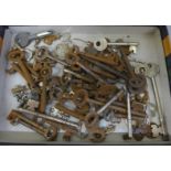 A collection of old door and cabinet keys