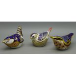 Three Royal Crown Derby bird paperweights; Nuthatch, Wren and Goldcrest, all with gold stoppers