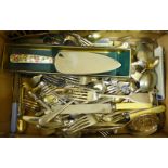 A box of plated flatware, etc. **PLEASE NOTE THIS LOT IS NOT ELIGIBLE FOR POSTING AND PACKING**