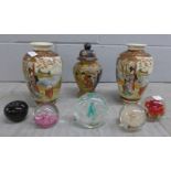 Five paperweights, Wedgwood, Caithness and three others, a pair of oriental vases, one a/f and an