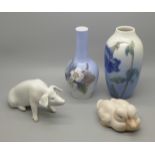 Four items of Royal Copenhagen; two flower vases, a pair of ducklings and a seated pig, no. 1400