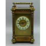 A French gilt brass and four glass sided carriage clock, 13cm