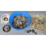 A tub of mainly foreign coins and banknotes but includes a part silver chain and coins with 1842