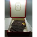 A vintage Christian Dior box and a pair of silk stockings