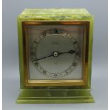 An onyx mantel clock, retailed by Poyser of Nottingham with Elliott movement