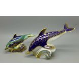 Two Royal Crown Derby paperweights, Blue Dolphin, 17cm and Baby Bottlenose Dolphin, in shades of