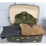 A suitcase of vintage (1960's onwards) lady's and gentleman's suede and leather coats, jackets and a