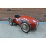 A vintage Alfa Romeo child's pedal car