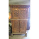 An Indian carved hardwood cabinet