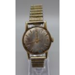 A 9ct gold Omega cased wristwatch, the case back bears worn inscription dated 1960, a/f