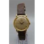 A gentleman's 14ct gold Omega automatic wristwatch, 32mm case