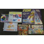 A Meccano Stephenson's Rocket kit, TCR Racing game, VTech Battleship Command and other games **