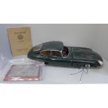 A De Agostini large scale model E Type Jaguar with additional E Type Jaguar booklet, lacking