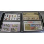 An album of Royal Mail Mint Stamp packs, 80 sets plus stamp booklets