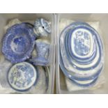 An eleven setting blue and white willow pattern dinner service, Mintons for Lawleys retailer and