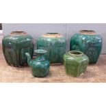 Three Chinese green glaze vases or ginger jars, one other similar and a jug