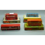 A Dinky Toys 283 Single Decker Bus, boxed and two other Dinky Toys buses and coach in blister packs