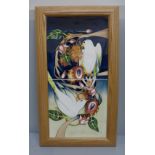 A Moorcroft two section tile panel of doves, signed E. Bossons, 72 of 200, framed