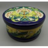 A Moorcroft circular lidded jar, trial version, dated 8.10.13, 16.5cm