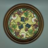 A framed Moorcroft charger, Berries, 1998, 252 of 750