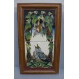 A Moorcroft two section tile panel, Cuckoo in Nest, signed Philip Gibson, framed