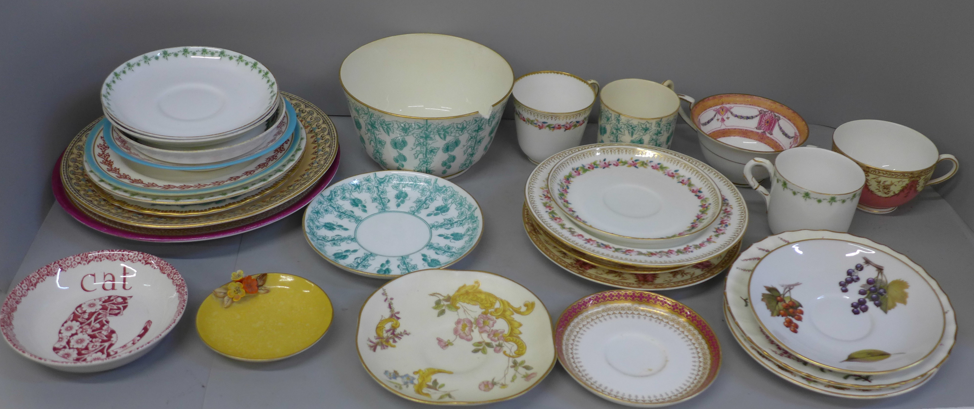 A collection of Royal Worcester plates, saucers and slop bowl, etc., bowl a/f, two trios and two